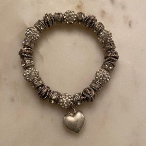 Silver bracelet with heart shape charm
